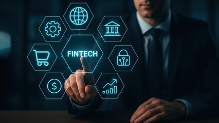 Businessman in suit reaching to tap floating fintech icons in blue lit office, showcasing secure innovation in ai finance, data security, fintech startup world