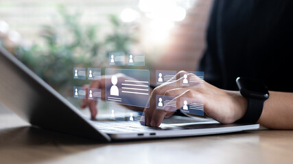 Businesses use digital systems to manage candidate profiles and resumes for recruitment. HR technology and automation for the hiring process.