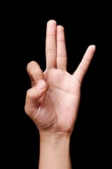 Hand showing number three gesture.