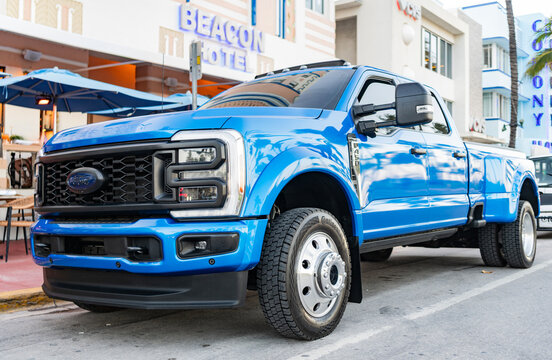 Miami, Florida, USA - April 07, 2025: Car Ford F250 parked outdoor. Blue pickup truck car, front view. 2020 Ford F250 pickup truck car. Blue pickup truck car Ford F250
