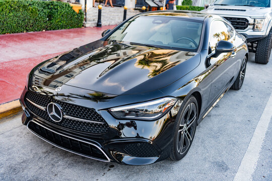 Miami, Florida, USA - April 08, 2025: Black car, low corner view. 2024 Mercedes Benz CLE 300 coupe car. Luxurious coupe Mercedes Benz 300 4MATIC. Car Mercedes Benz 300 parked outdoor