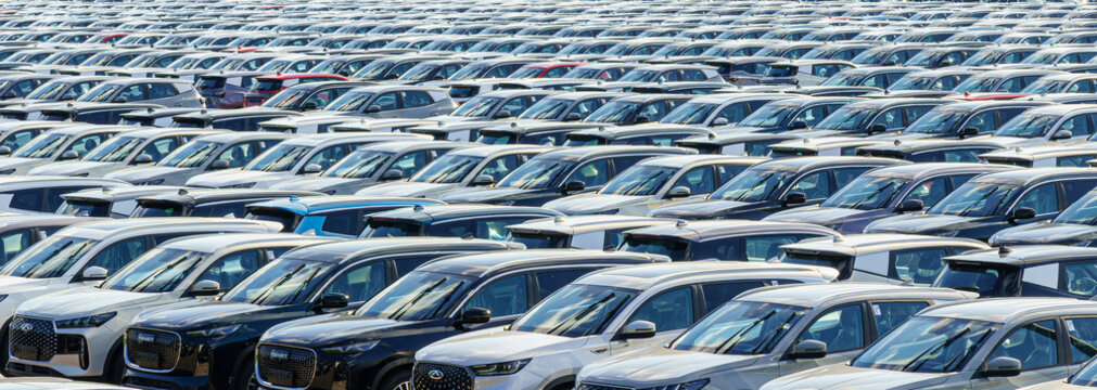 Russia, Kaluga, AGR Automotive Group - July 7, 2025: New Chery and Tenet cars parked at factory storage lot. Vehicle import and export. Automobile logistics and transportation.