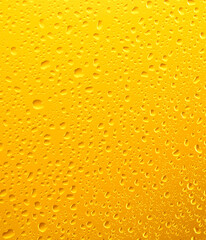 Close up of a cold glass of beer with condensation