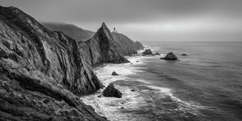 Black and White Coastal Cliffs with Lighthouse on Rocky Shoreline