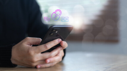 Hand holding smartphone with unlocked padlock and cloud icon, symbolizing data security breach, cloud storage risk, mobile privacy threat, and digital protection failure.