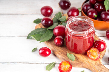 Cherry plum jam in small jar