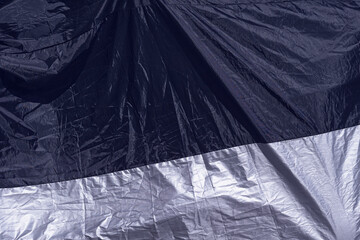 Black silver awning for protection and covering of something