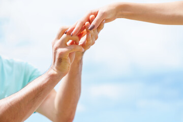 Beach Engagement Proposal Moment, Romantic Caucasian Couple Exchanging Rings on Summer Seaside Vacation in Emotional and Outdoor Love Scene