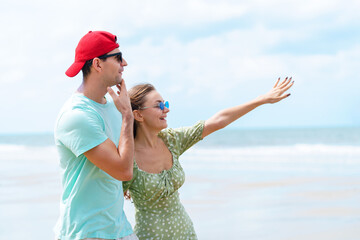 Beach Couple Sharing Sweet Romantic Moment, Caucasian Man and Woman Enjoying Vacation Together on Summer Seaside in Natural Outdoor Mood