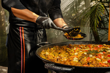Preparing a delicious seafood paella