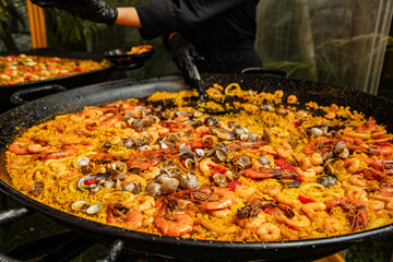 Preparing a delicious seafood paella