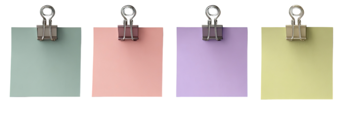 Four pastel-colored notepads with metal clips