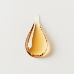 Single Golden Amber Drop on White Background liquid