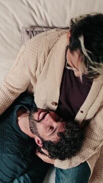 Vertical video, Gay Couple Relaxing Together At Home