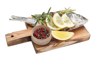 Tasty roasted dorado fish with rosemary and lemon isolated on white. Homemade seafood dish