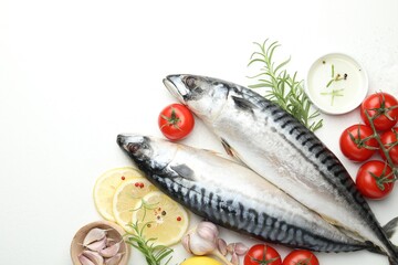 Seafood delicacies. Fresh raw mackerels and spices on white table, flat lay. Space for text