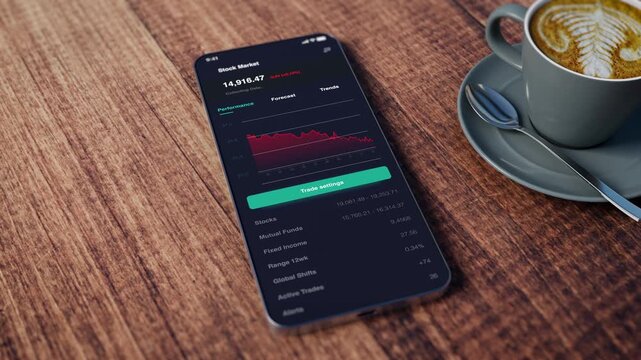 Close-up of stock market graph chart on a smartphone, indicating trading, investing, or financial analysis. Global economy&nbsp;markets. Stock price falling, crisis, wealth, Shrinking, Coffee shop.