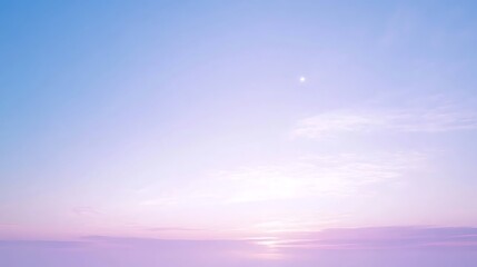 Ethereal pastel sky with soft clouds at sunrise or sunset, creating a serene atmosphere