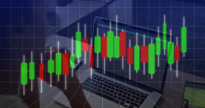 Displaying candlestick chart overlay on office wood desk, with laptop, smartphone and coffee mug