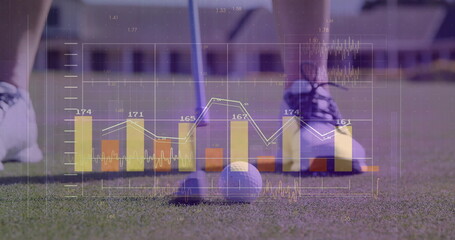 Aligning golfer lining up golf ball on tee on green, with bar charts and line graphs