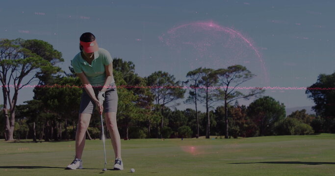 Putting golfer on putting green with red visor, putter, ball, pink hologram overlays, copy space