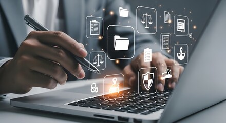 Business professional interacting with digital icons and data on a laptop screen