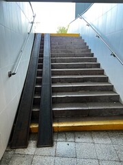 Steps, stairs with handrails, railings, descent and ascent for people with disabilities, baby...
