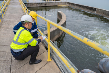 Environmental engineers work at wastewater treatment plants,Water supply engineering working at...