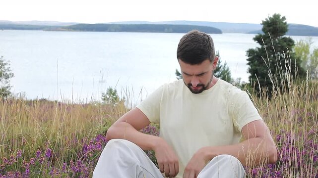 Man feeling some discomfort with his abdomen 