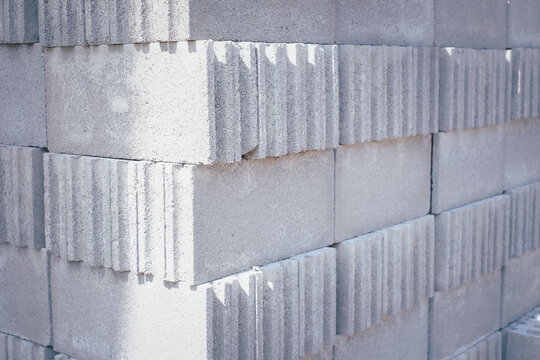 A wall made of gray bricks - Powered by Adobe