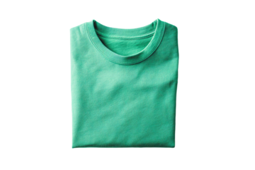 a green shirt is laying on a white surface