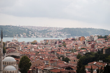 A cityscape view over the Bosporus of the suburbs in the city of Istanbul, Turkey.