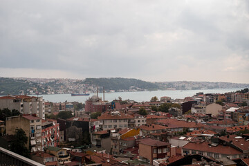 A cityscape view over the Bosporus of the suburbs in the city of Istanbul, Turkey.