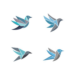 Obraz premium Geometric origami style birds in flight symbolizing freedom and movement