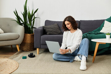 Freelancer immersed in creative work at home in a cozy living space