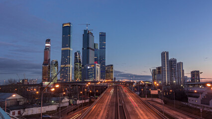 Moscow City business center skyscrapers office buildings and luxury apartments day to night timelapse hyperlapse.