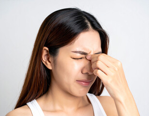 Woman Pressing Eye from Fatigue 眼精疲労で目を押さえる女性