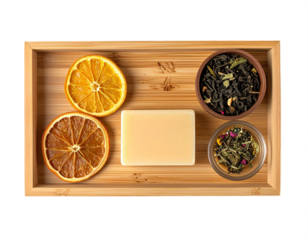 Natural spa set with dried oranges soap and herbal tea in a bamboo tray