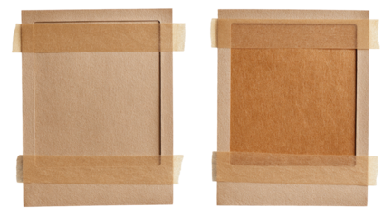 Two identical, light brown cardboard frames, possibly for artwork or documents, secured with light brown masking tape