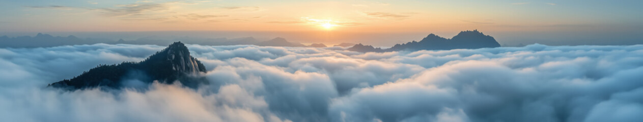 Obraz premium Mountain Above Clouds at Sunrise