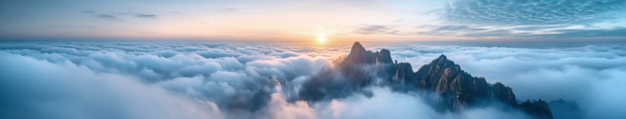Obraz premium Mountain Above Clouds at Sunrise