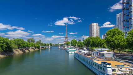 Eiffel tower at the river Seine timelapse hyperlapse from bridge in Paris, France