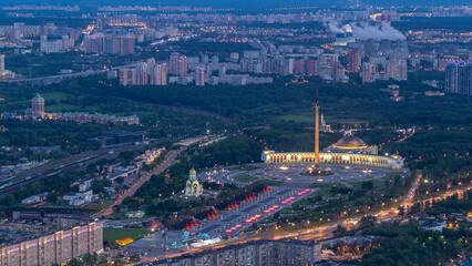 Aerial top view of Moscow city day to night timelapse after sunset. From the observation deck