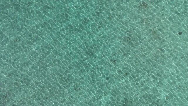 Aerial drone view of a tropical beach on Kakeromajima Island, Amami, Japan
