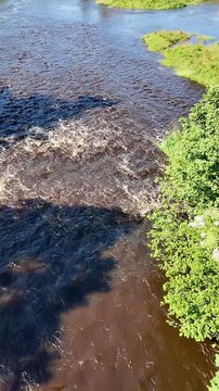 Drymen Glasgow Scotland UK. 08.07.2025. Video. Overview of The Endrick Water at Drymen village flowing to Loch Lomond Western Scotland. UK.