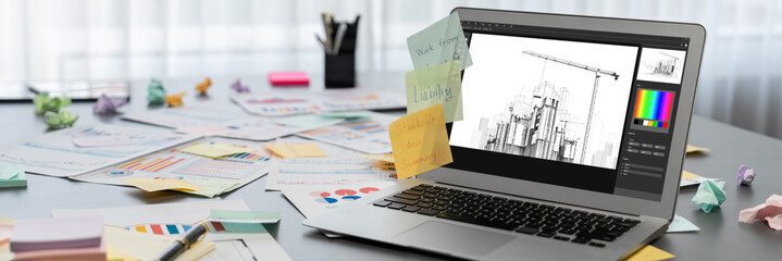 Sticky note for creative and analytic brainstorm for business idea with BI data dashboard on laptop...