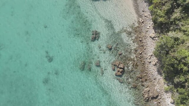 Aerial drone view of a tropical beach on Kakeromajima Island, Amami, Japan

