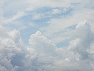 Cumulonimbus clouds, thunderheads forming within a blue sky, over Kent County, Delaware. Cloudscape.