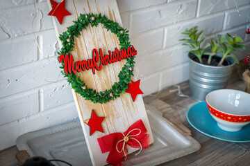 Christmas card conception. Christmas toy deer decoration with christmas tree branch and snow