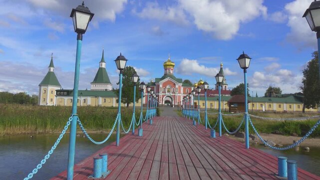 View of the Valdai Iversky Bogoroditsky svyatoozersky monastery. Sunny June day . Russia,Ancient Russian Iversky Monastery at Valdaysky National Park.